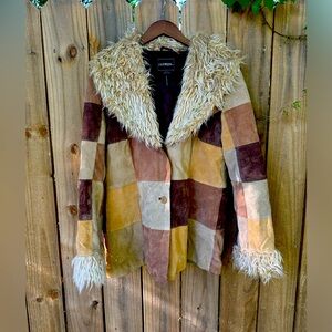 Own a piece of sartorial history. Vintage brown patchwork, leather jacket.